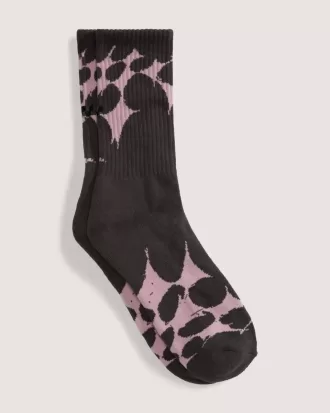Calcetines deportivos con diseño de telaraña salpicada de skate