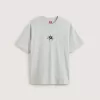 Camiseta con salpicaduras de skate