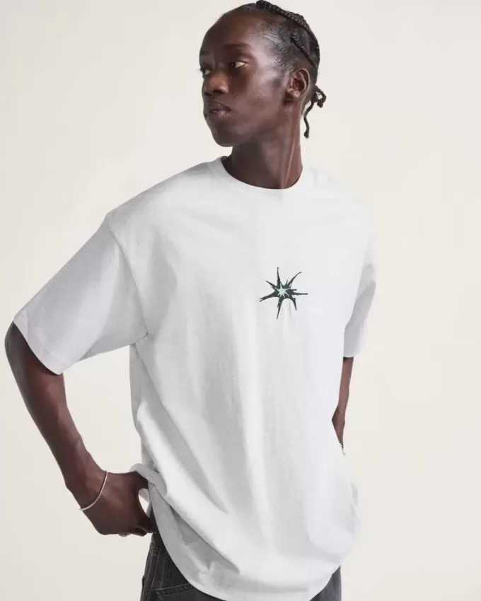 Camiseta con salpicaduras de skate