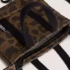 Charm para bolso de mano con microperforaciones