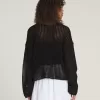 Suéter corto de punto abierto Mila